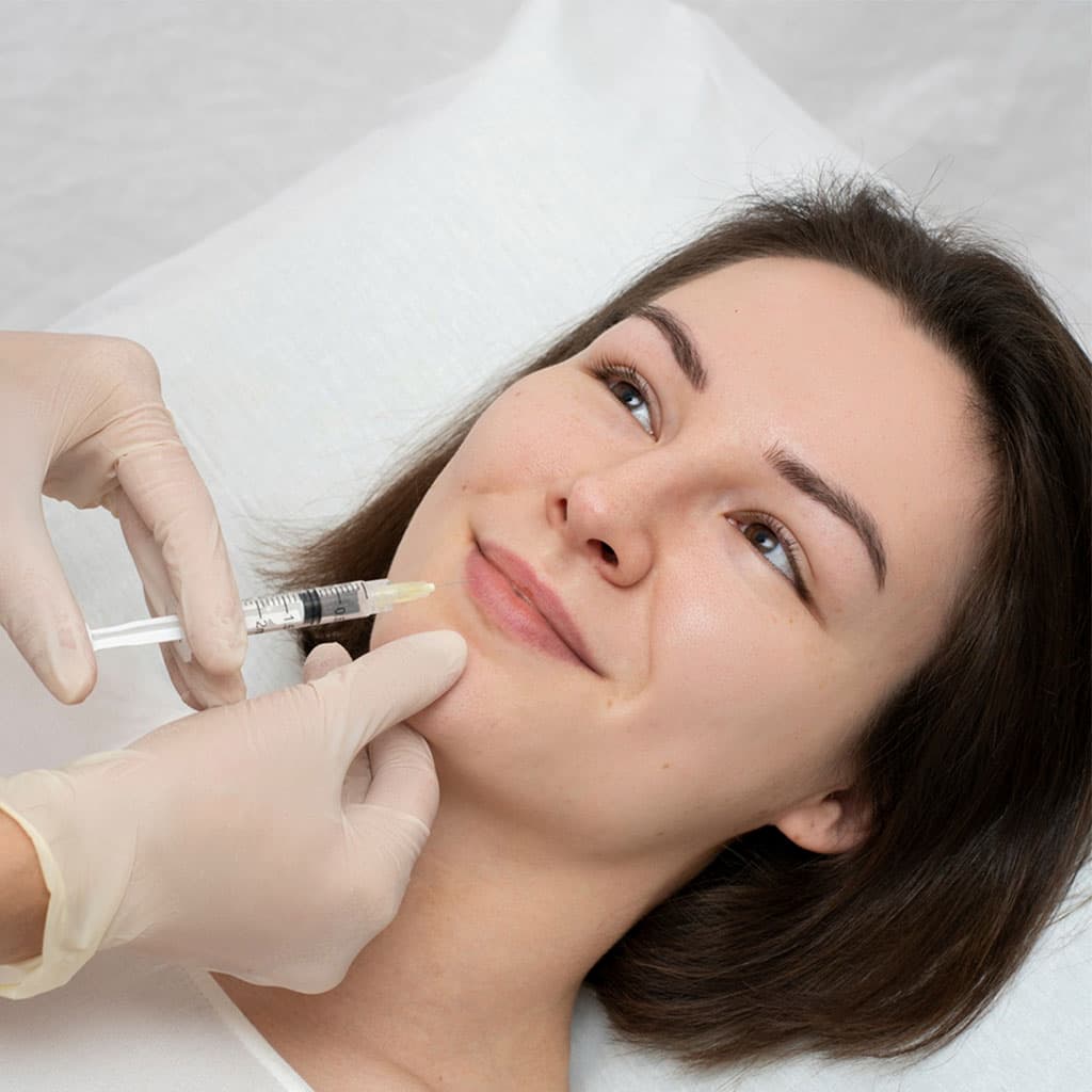 Patient receiving a Botox treatment from a clinician